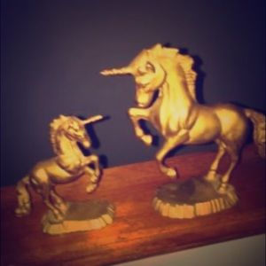 Vintage solid brass unicorns